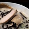 a close up of a bowl of food on a table