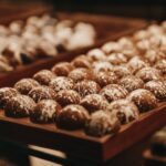 a close up of a tray of doughnuts