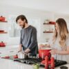 man and woman on kitchen